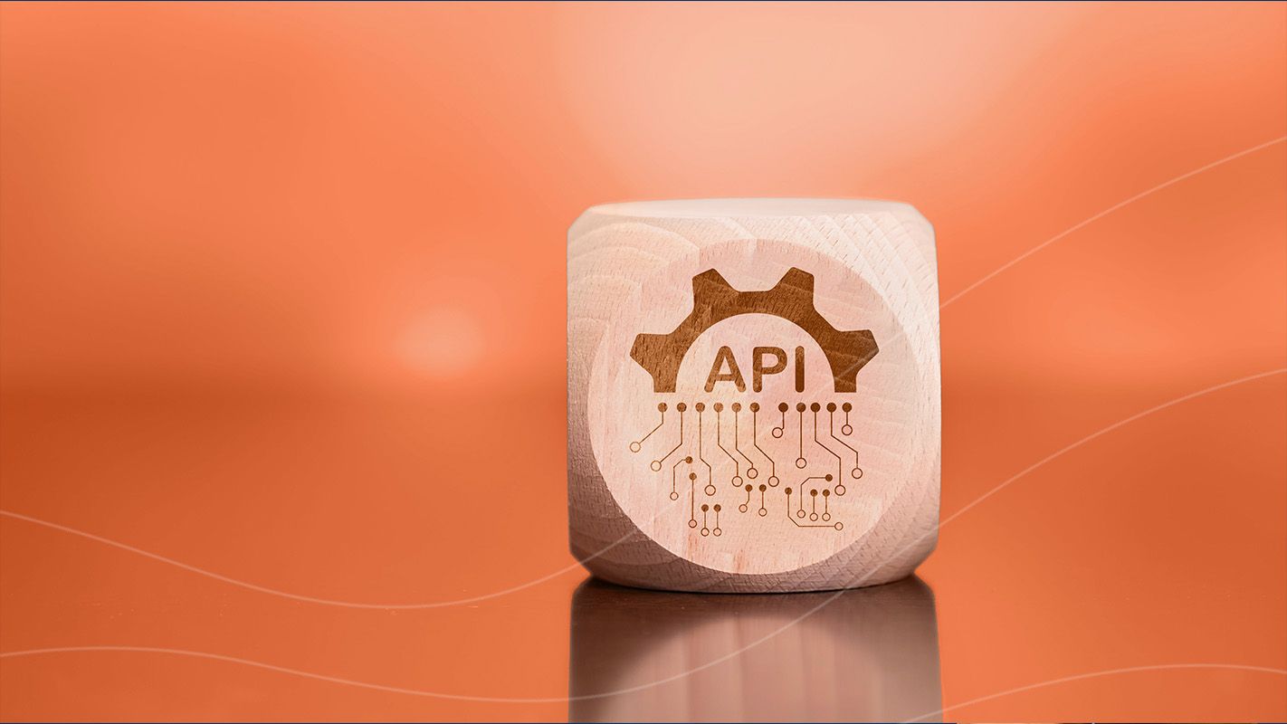 What is an API and what is its role in telecommunications?